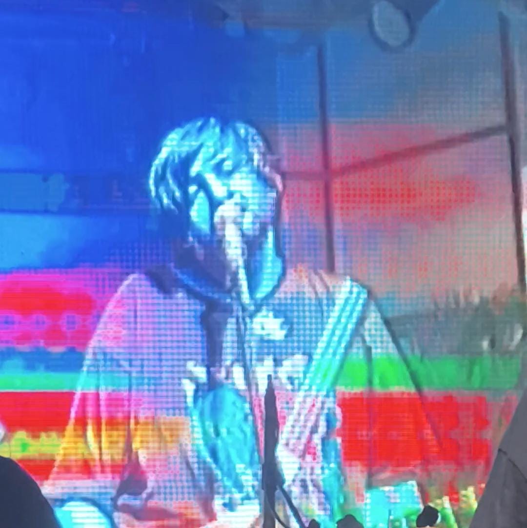 The Broadway Addicts performing in front of live visuals on LED